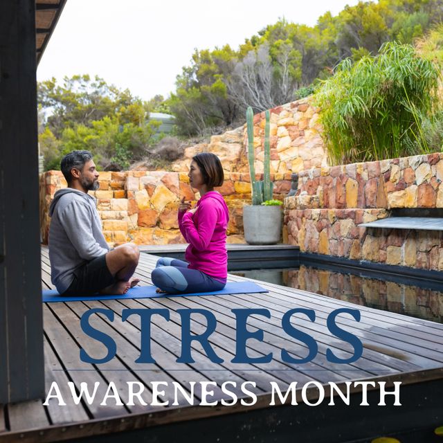 Composition of stress awareness month text over diverse couple doing yoga. Stress awareness month concept digitally generated image.