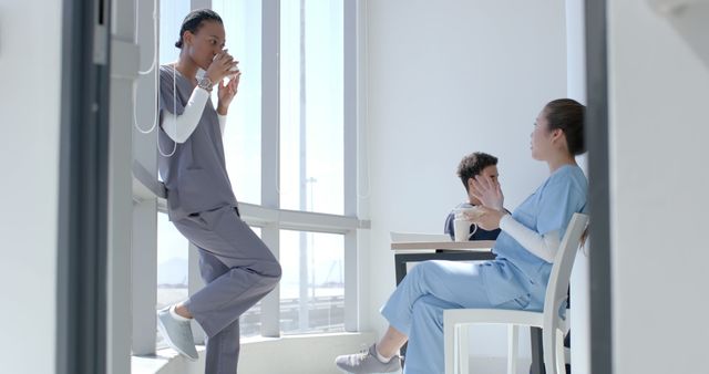 Healthcare Workers Relaxing During Break in Hospital - Download Free Stock Images Pikwizard.com