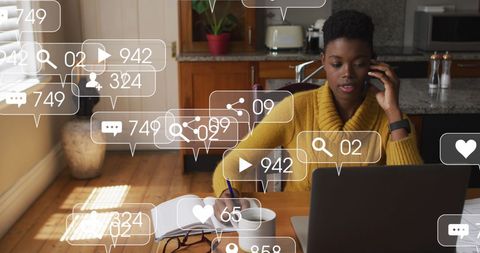 African american woman engaging with online community from home