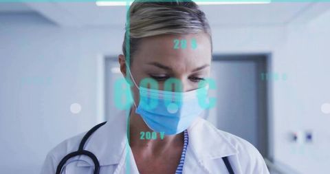 Doctor Analyzing Data Overlays in Hospital Corridor