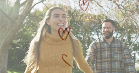 Couple Share Joyful Moment on Autumn Walk in Park