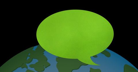 Green speech bubble above globe on black background