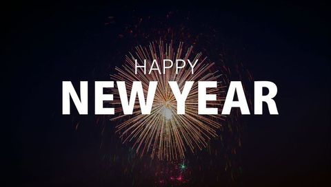 Happy new year firework burst with bold new year typography over dark night sky