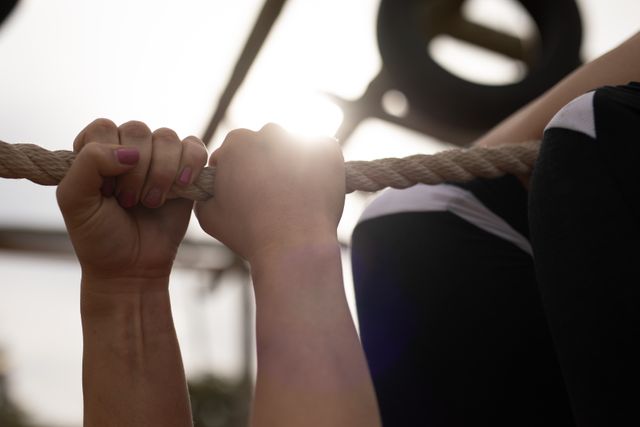 Close-Up of Hands Holding Rope During Outdoor Boot Camp Exercise - Download Free Stock Images Pikwizard.com