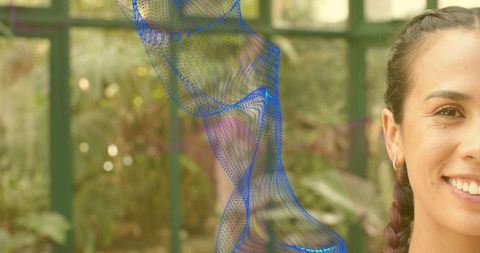 Smiling woman posing in sunlit greenhouse with braided hair and blue mesh overlay