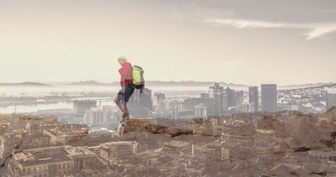 Senior Woman Hiking Overlooking Urban Cityscape Layer
