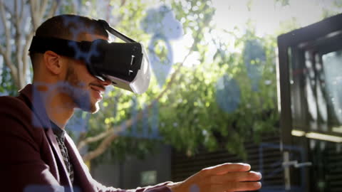 Man Immersed in Virtual Reality Outdoors with Futuristic Overlay