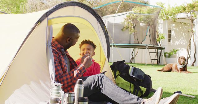 Father and Son Enjoying Camping in Backyard Tent with Pet Dog - Download Free Stock Images Pikwizard.com