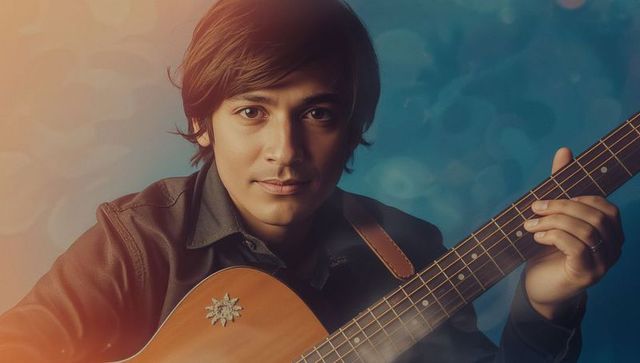 Asian Musician Holding Acoustic Guitar in Studio with Star Inlay