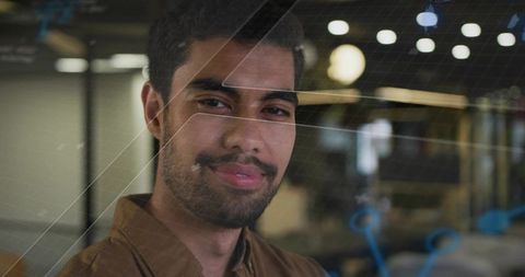 Professional Man Engaging with Digital Interface in Office