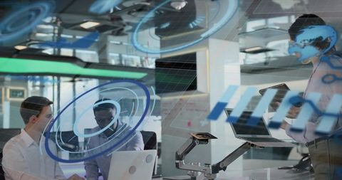 Business team collaborating with augmented reality interfaces in modern open-plan workplace