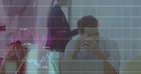 Stressed Business Professional Analyzing Financial Data in Office