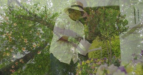 Woman Gardening in Tranquil Greenery Watering Flowers
