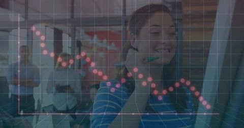 Professional Analyzing Business Graph on Transparent Board