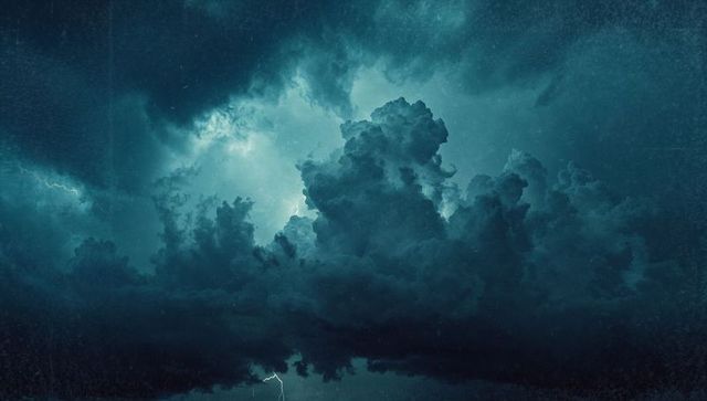 Dramatic Night Sky with Swirling Storm Clouds and Lightning