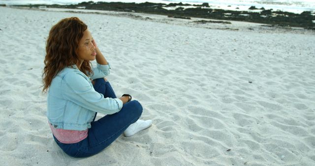 Young Woman Reflecting on Sandy Beach at Sunset - Download Free Stock Images Pikwizard.com