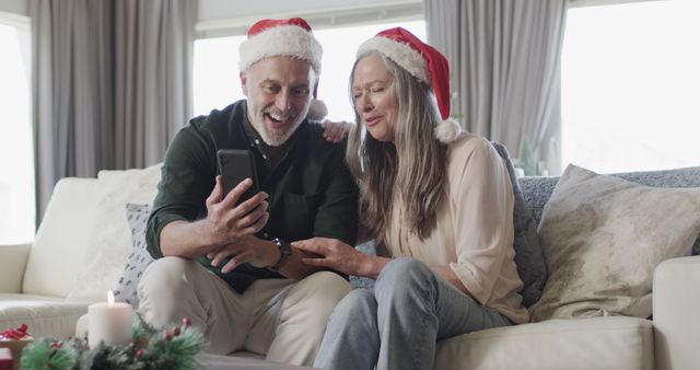 Happy Senior Couple Video Calling Family During Christmas - Download Free Stock Images Pikwizard.com