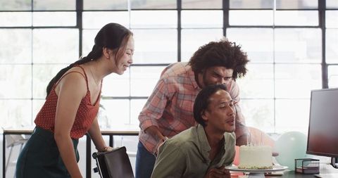 Birthday Celebration in Office with Diverse Team Members and Cake
