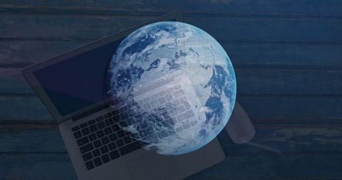 Global Business Technology Concept with Earth and Laptop