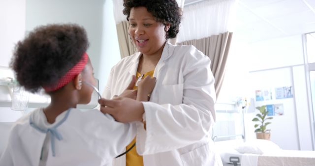 Pediatrician Using Stethoscope to Examine Child in Hospital Room - Download Free Stock Images Pikwizard.com