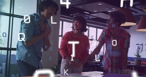 Creative Team Celebrating Breakthrough During Office Brainstorm With Digital Code Overlay