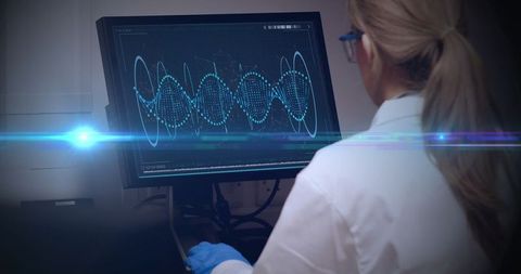 Female Scientist Analyzing Data on Computer Screen with Digital Interface - Download Free Stock Images Pikwizard.com