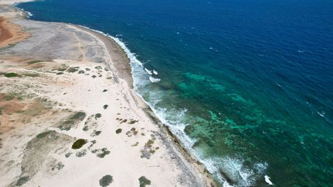 Pristine Coastal Landscape with Turquoise Waters and Sandy Beach