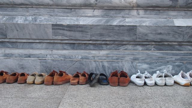Assorted Shoes in a Row on Concrete Staircase - Download Free Stock Photos Pikwizard.com