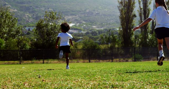 Children Running on Grass Field at Park - Download Free Stock Images Pikwizard.com