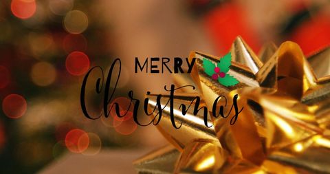 Festive christmas greeting with golden decor and holly leaves