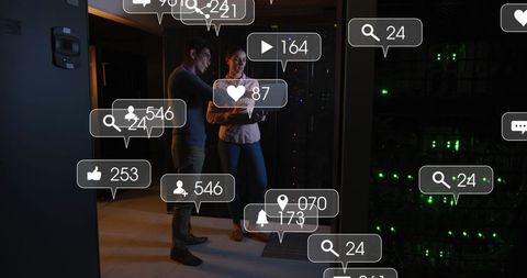 Engineers Analyzing Data with Social Media Icons in Modern Server Room - Download Free Stock Images Pikwizard.com