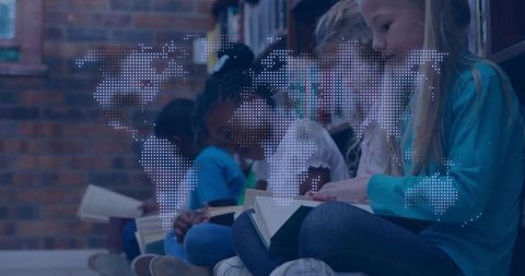 Children reading books in library with digital world map overlay