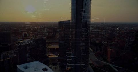 Futuristic Cityscape with Dusk Skyline and Digital Code Overlay