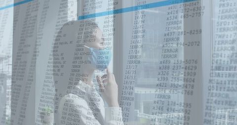 Businesswoman Analyzing Financial Data during COVID-19 Pandemic