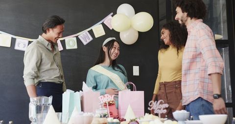Colleagues Celebrating Baby Shower at Office Gathering