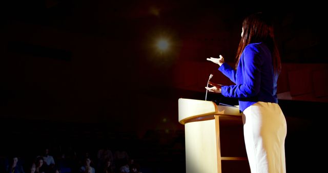 Confident Woman Delivering Inspirational Speech on Stage - Download Free Stock Images Pikwizard.com