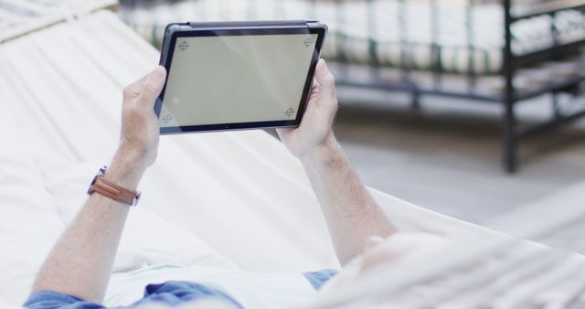 Relaxation in Hammock While Using a Tablet - Download Free Stock Images Pikwizard.com