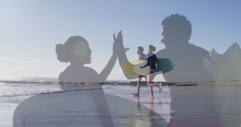 Joyful Couple Surfing and High Fiving on Beach Vacation