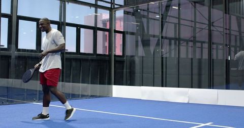 Dynamic Padel Session on Indoor Blue Court
