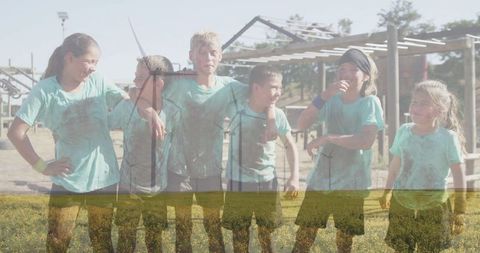 Energetic Kids Smiling After Completing Rugged Obstacle Course