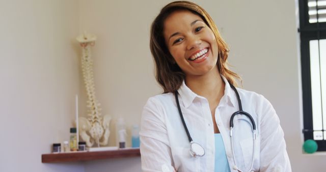 Smiling Female Doctor with Stethoscope in Medical Office - Download Free Stock Images Pikwizard.com