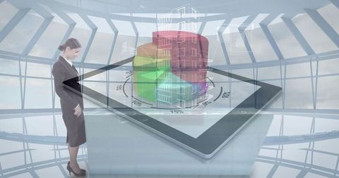 Businesswoman interacting with holographic urban planning model