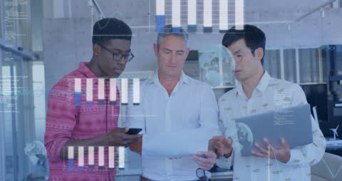 Multiethnic Business Team Analyzing Financial Data in Modern Office