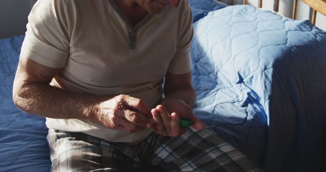 Senior Man Taking Medication at Home in Morning Light - Download Free Stock Images Pikwizard.com