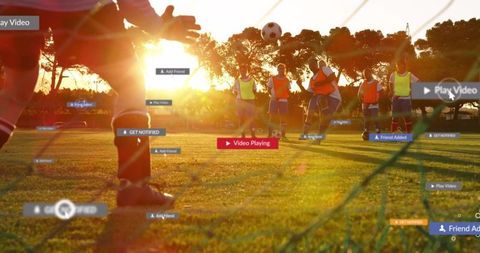Women soccer players practicing with digital ui overlays at sunset