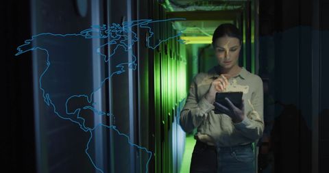 Caucasian female engineer using tablet in advanced server room