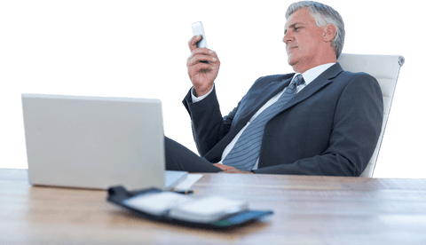Confident Senior Businessman Using Smartphone with Laptop Transparent