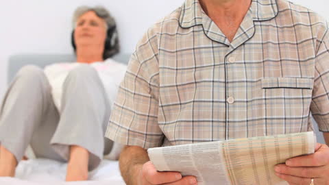 Elderly Couple Connecting through Relaxing Activities at Home