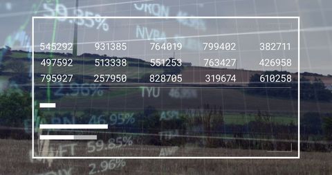 Digital data processing with changing numbers overlaid on rural landscape