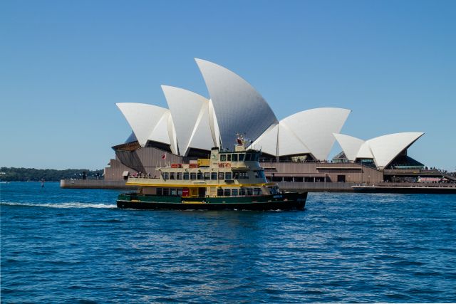 Sydney Harbour Ferry Sailing Past Sydney Opera House on Bright Day - Download Free Stock Images Pikwizard.com
